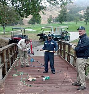 Brian Sjögren, Mario Gonzalez and Rick Smith building a bridge on No. 17 at Corral de Tierra.