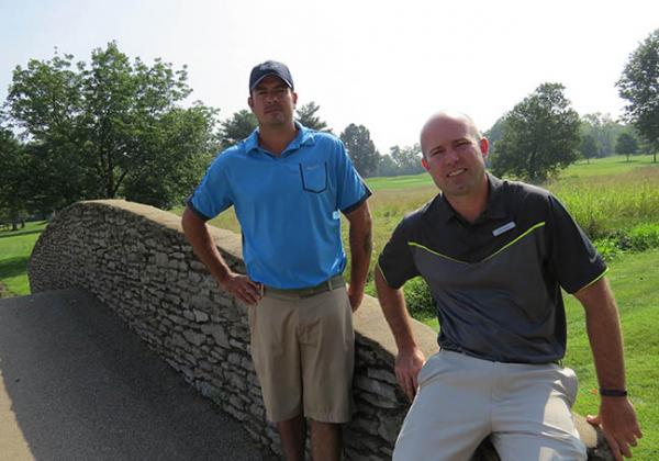 Zach Newell, left, and Scott Bender, CGCS, have created a picture of serenity in an unlikely urban location.