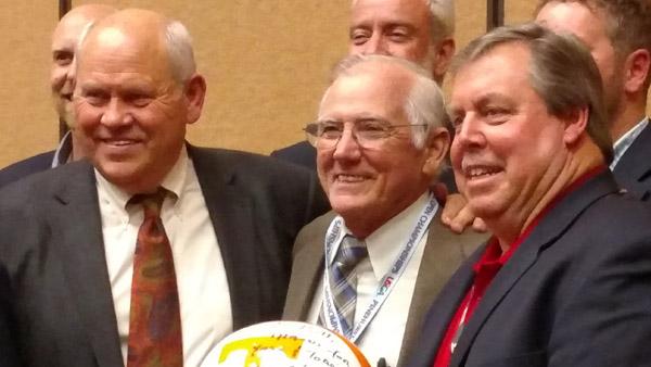 Former University of Tennessee football coach Phillip Fulmer (left) spends time at the Tennessee Turfgrass Association Conference and Show with former UT sports turf manager Bobby Campbell (center) and Bill Blackburn of Smith Turf and Irrigation (far right).