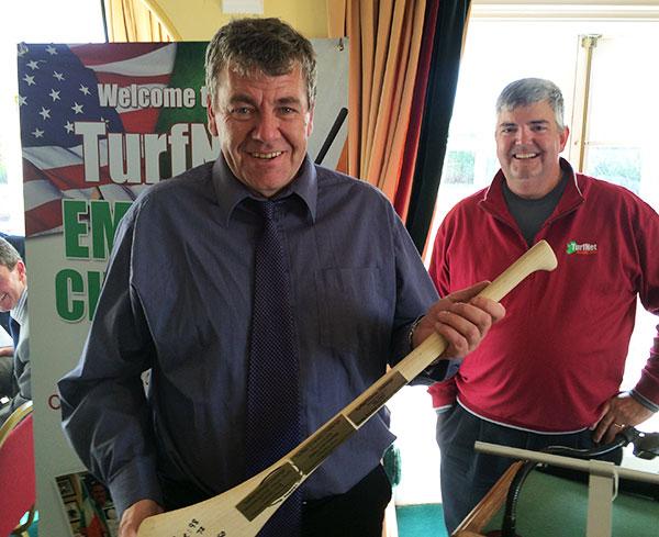 Frank Byrne proudly accepts the Hurley Trophy for Team Ireland.