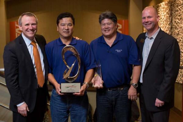 David Withers, president of Jacobsen, Al Kakazu, president of B. Hayman, Guy Hera, sales manager at B. Hayman, and Troy Murray, director of sales for Jacobsen (left to right).