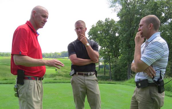 Oakmont superintendent John Zimmers, left, discusses U.S. Open preparations with assistant Mike McCormick, center, and David Delsandro, director of U.S. Open operations and projects.