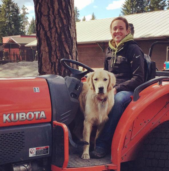 Jessica Lenihan and her dog Kevin hard at work at Hayden Lake Country Club.