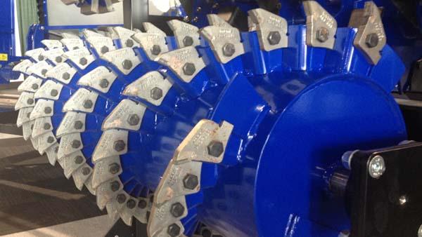 Hundreds of blades on a fraise mower helix rotor.